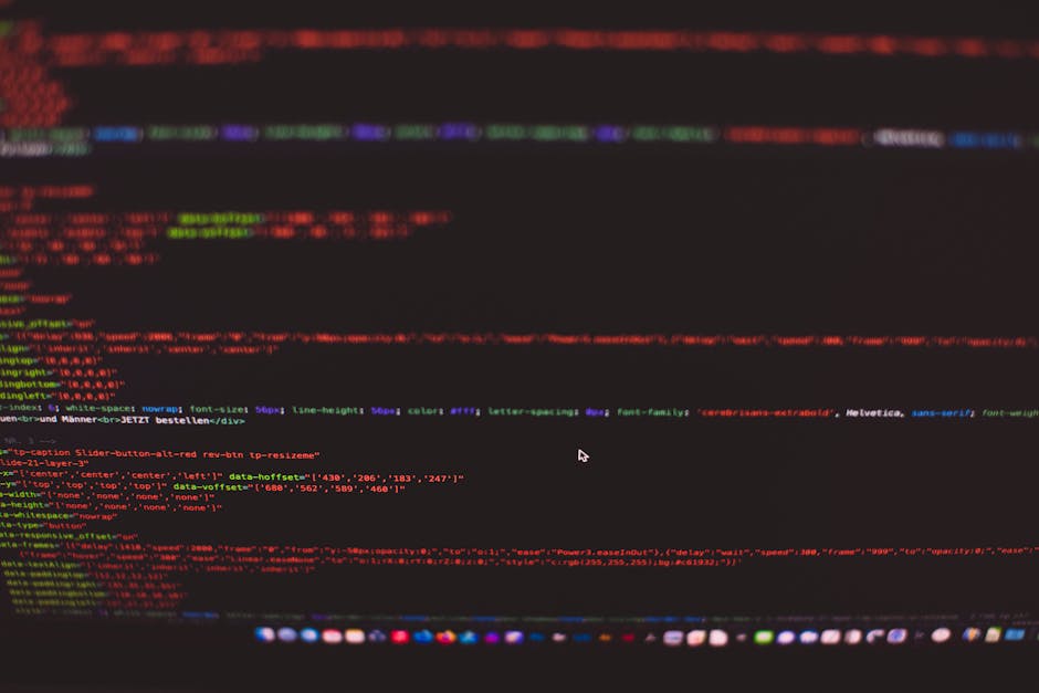 A close-up image of a computer screen displaying colourful lines of programming code with syntax highlighting, including keywords, variables, and functions in various colours such as red, green, blue,